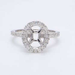 Halo semi-mount with shared prong set round diamonds.  D0.50ct.t.w.