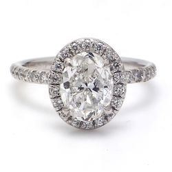 Halo semi-mount in platinum with prong set round diamonds.  D0.42ct.t.w.   Size 7