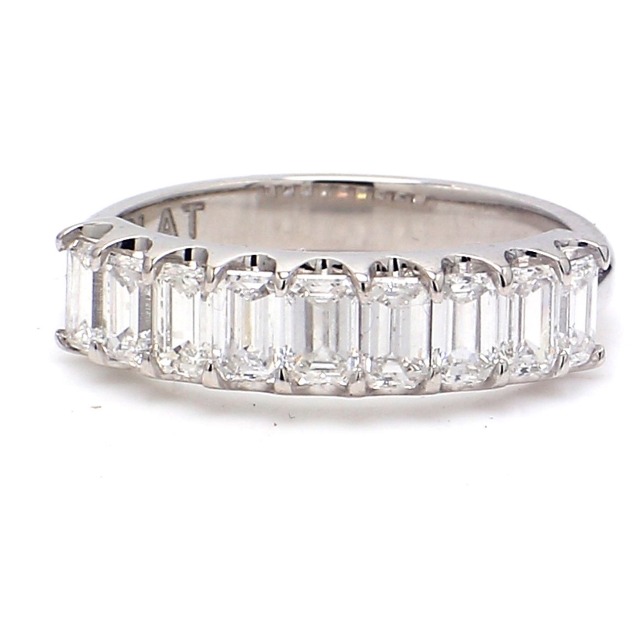 9-stone band in platinum with U-prong set emerald cut diamonds.  D1.12ct.t.w.  Size 5.25