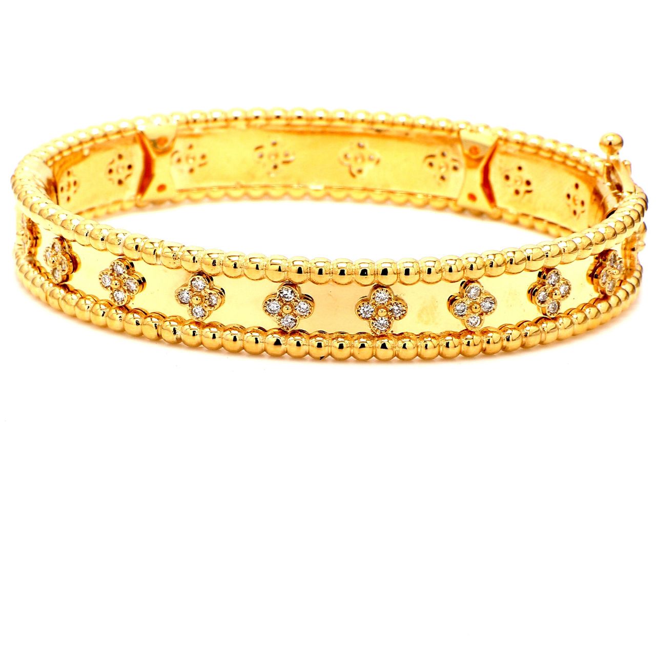 Bangle in 18K YG with prong set round diamonds.  D0.84ct.t.w.