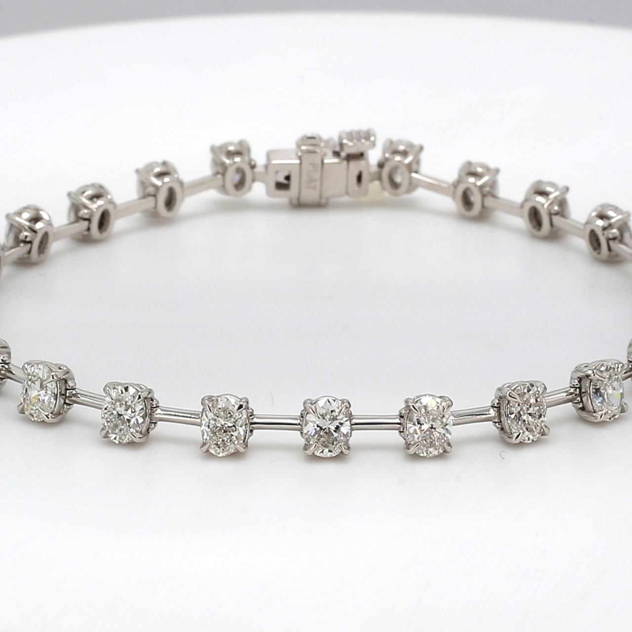 7' Bar style tennis bracelet in platinum with prong set (24) oval diamonds.  D5.75ct.t.w.
