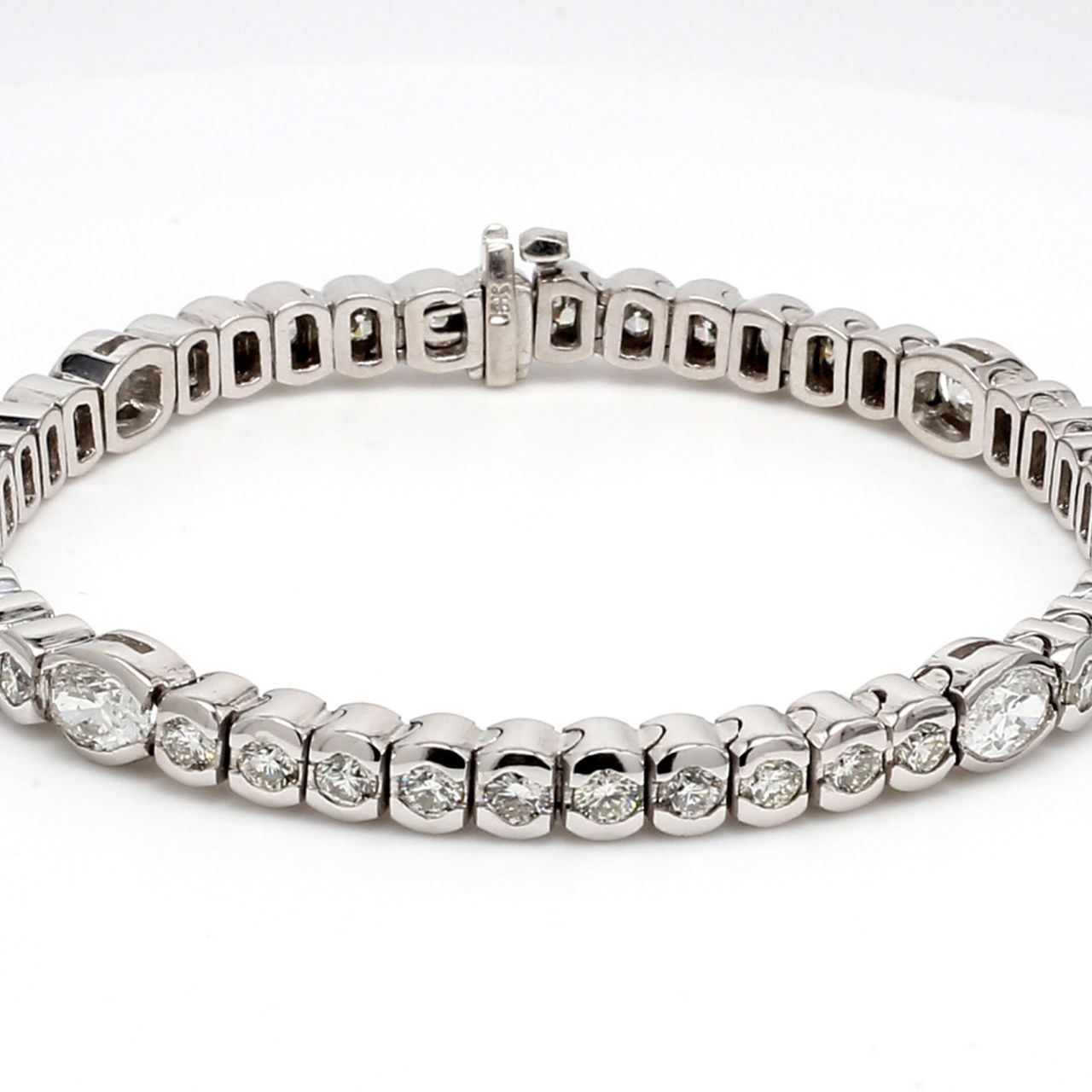 7' Tennis bracelet with round & oval cut diamonds.  D5.86ct.t.w.
