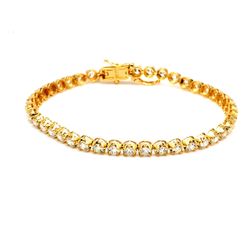 7.5' Tennis bracelet in 14K YG with illusion prong set (42) round diamonds.  D5.36ct.t.w.