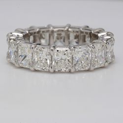 Eternity band in platinum with basket set G-H/VVS-VS (16) radiant cut diamonds.  D8.79ct.t.w.  Size 6.5