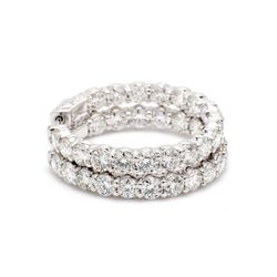 1.25' Inside out hoop earrings with shared prong set round diamonds.  D7.72ct.t.w.