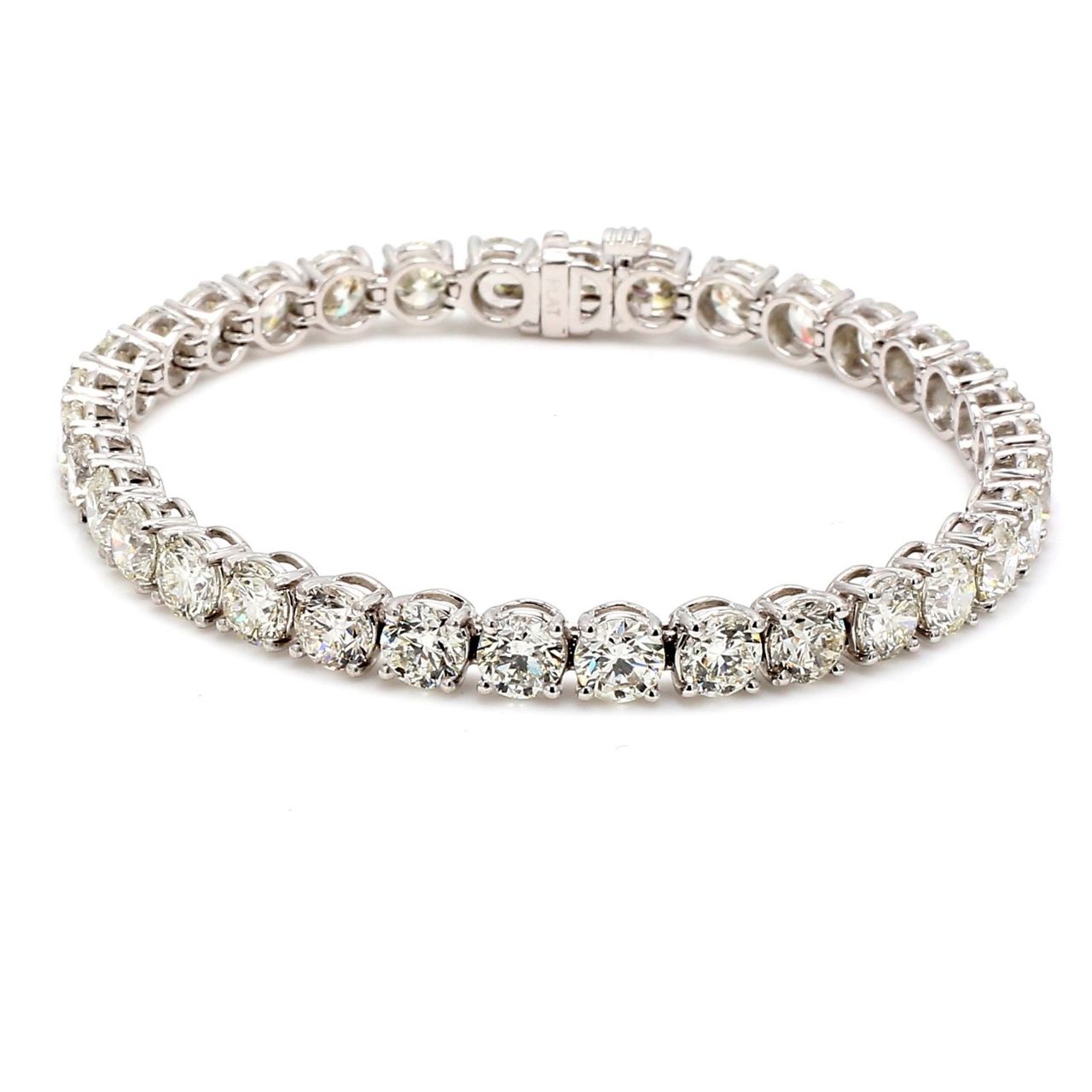 7' Tennis bracelet in platinum with basket prong set (34) round diamonds.  D17.03ct.t.w.