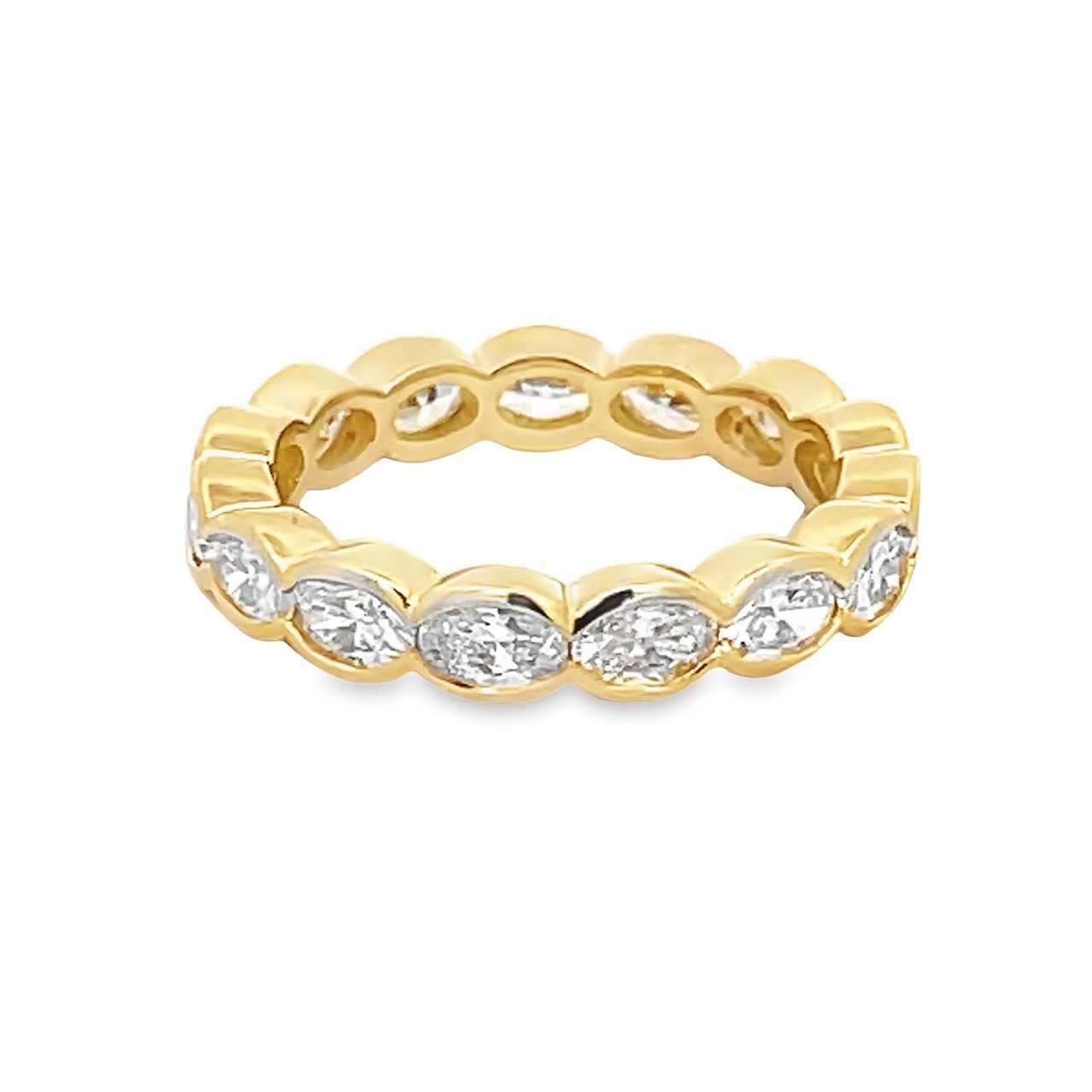 Eternity band east west style in 18K YG with bezel set (15) oval diamonds.  D2.28ct.t.w.  Size 5.75