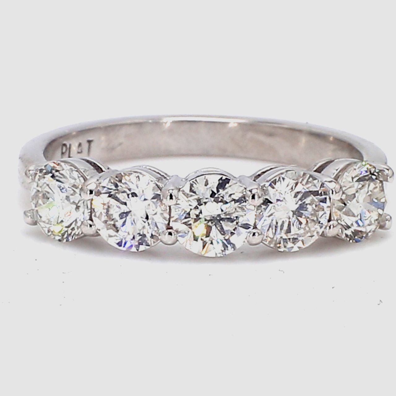 5-stone band in platinum with basket prong set round diamonds.  D1.16ct.t.w.  Size 4.75