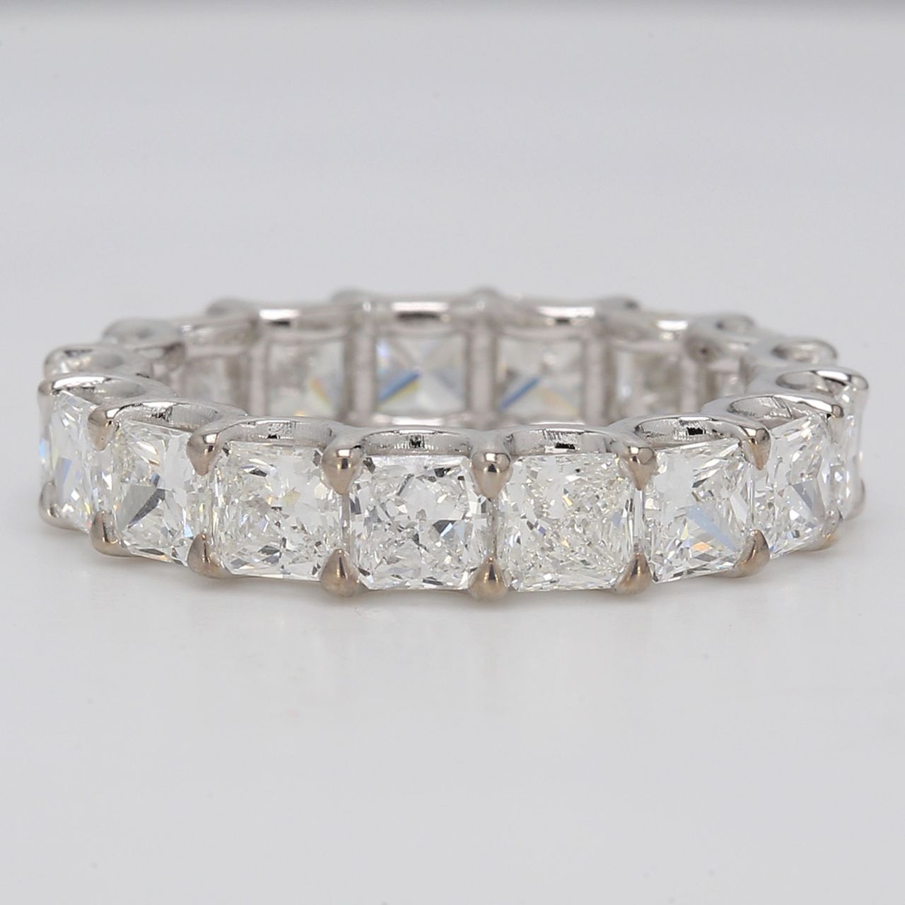 Eternity band in platinum with U-prong set square radiant diamonds.  D4.17ct.t.w.  Size 5.5