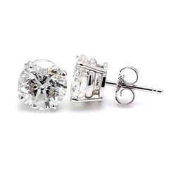 Push back stud earrings with 4-prong basket set round diamonds.  D0.50ct.t.w.