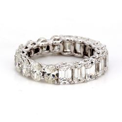 Eternity band in 18K WG with shared U-prong set oval & emerald cut diamonds.  D4.24ct.t.w.