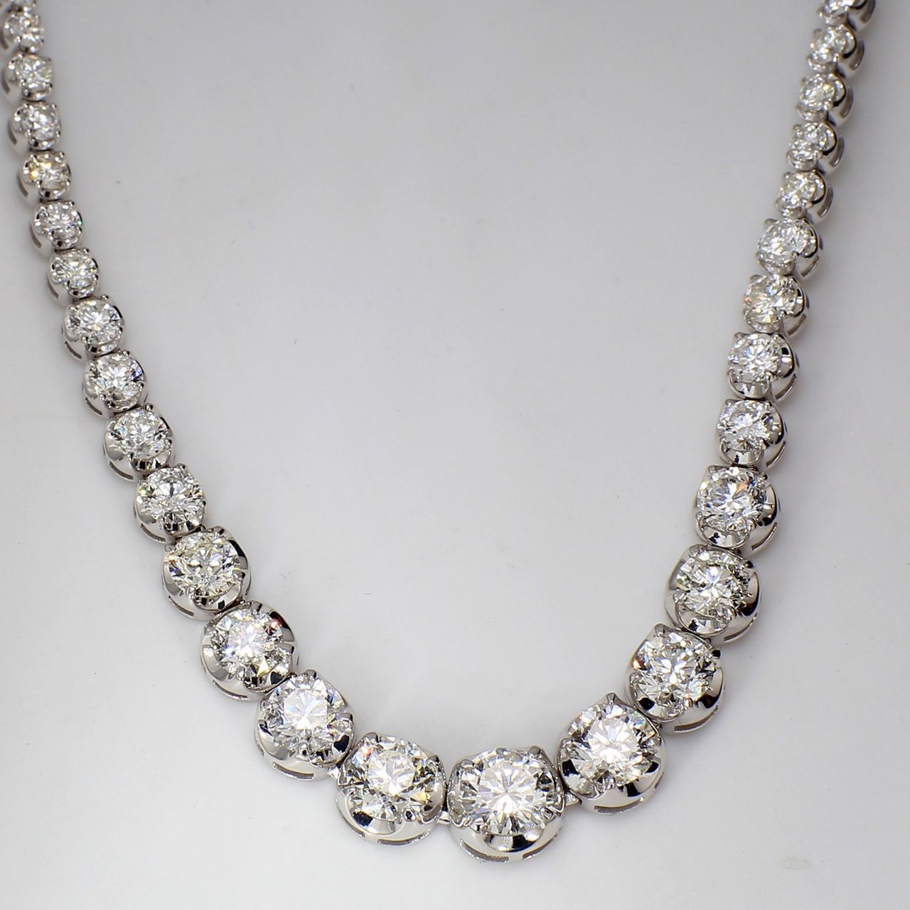 17' Graduated tennis necklace in 18K WG with U-prong set (102) round diamonds.  D15.74ct.t.w.