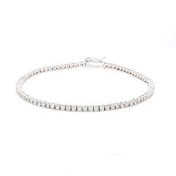 7' Tennis bracelet with 4-prong basket set (63) round diamonds.  D3.98ct.t.w.