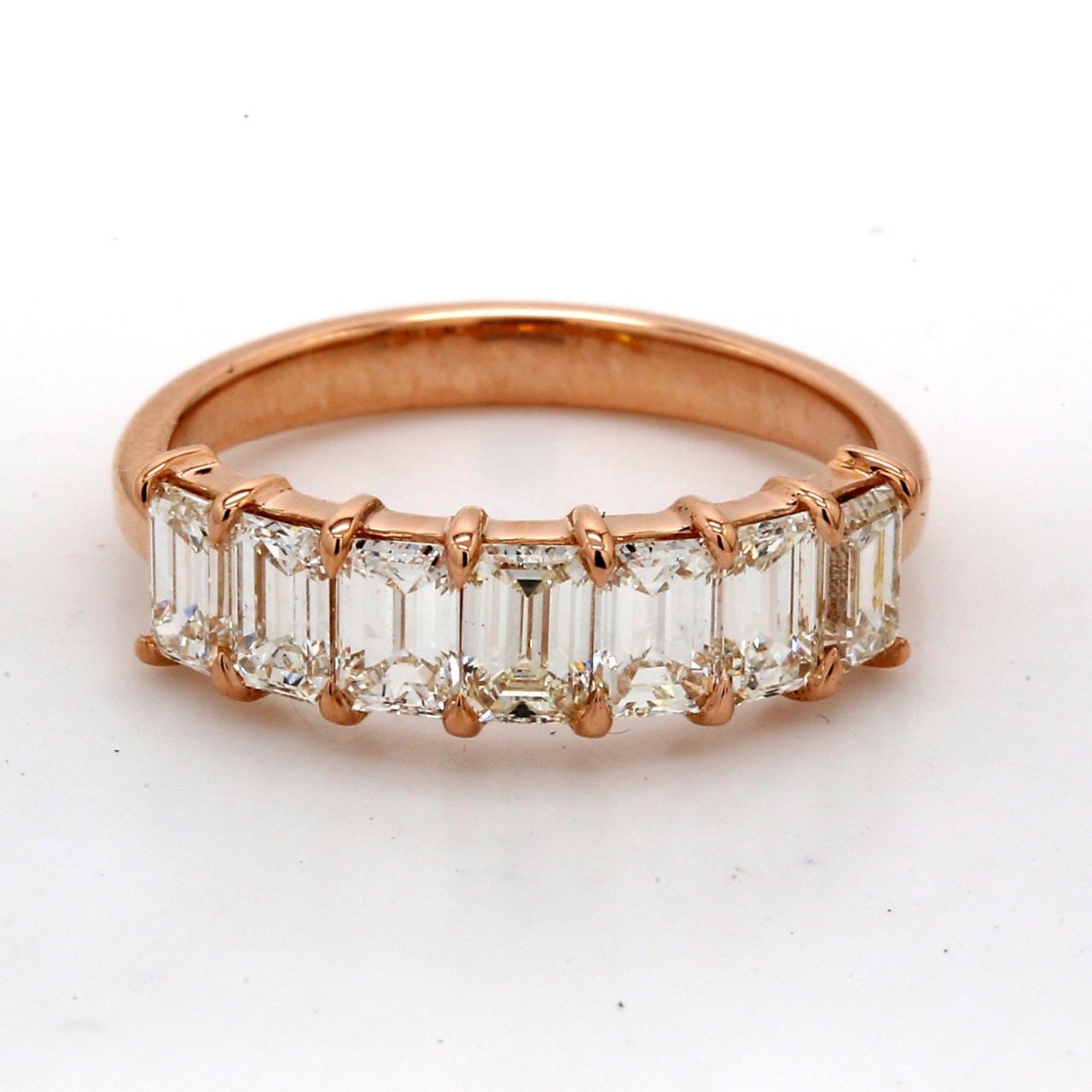 7-stone band in 18K RG with basket prong set emerald cut diamonds.  D1.53ct.t.w.  Size 5.75
