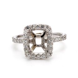 Halo semi-mount with shared prong set round diamonds.  D0.55ct.t.w.  Size 5.75