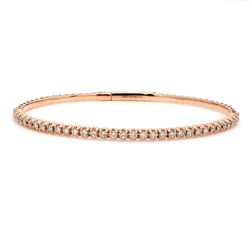 Light weight flexible oval shaped bangle in 18K RG with prong set round diamonds.  D1.00ct.t.w.