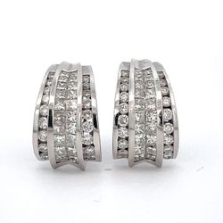 French clip earrings with channel set rounds & 2-row invisible set princess cut diamonds.  D4.30ct.t.w.