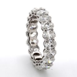 Eternity band in platinum with basket prong set (20) oval cut diamonds.  D3.24ct.t.w.  Size 5