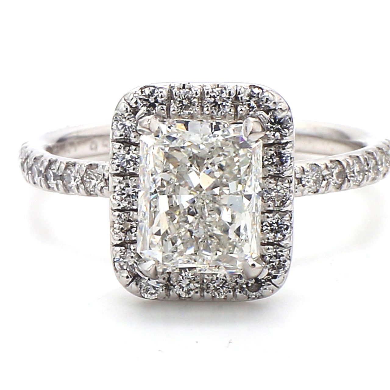 Halo semi-mount in platinum with round diamonds.  D0.46ct.t.w.  Size 6.75