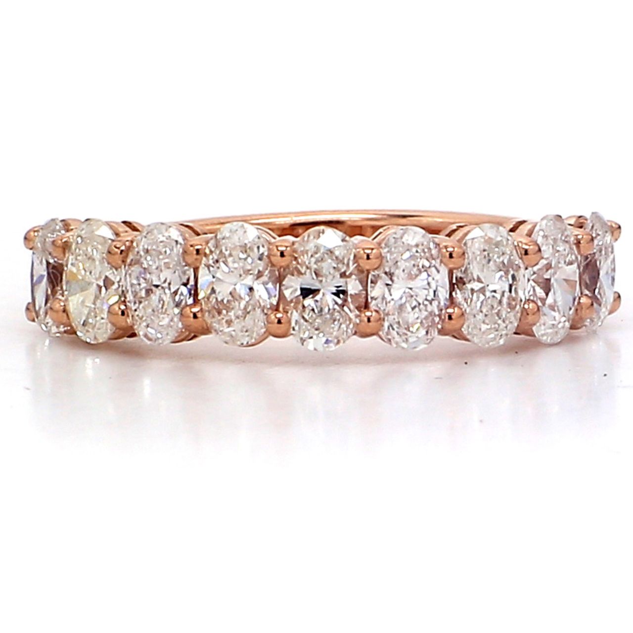 9-stone band in 18K RG with basket prong set oval cut diamonds.  D1.22ct.t.w.  Size 5