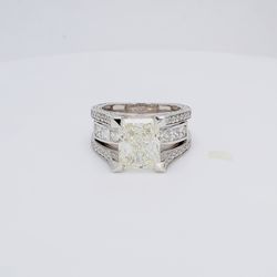 Semi-mount with channel princess cuts & pre-set round diamonds.  D2.29ct.t.w.  Size 6.5