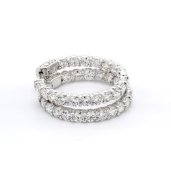 1.25' Inside out hoop earrings with shared prong set F-G/VS2-SI1 round diamonds.  D6.90ct.t.w.