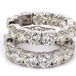 0.75' Inside out hoop earrings with prong set (20) round diamonds.  D6.21ct.t.w.