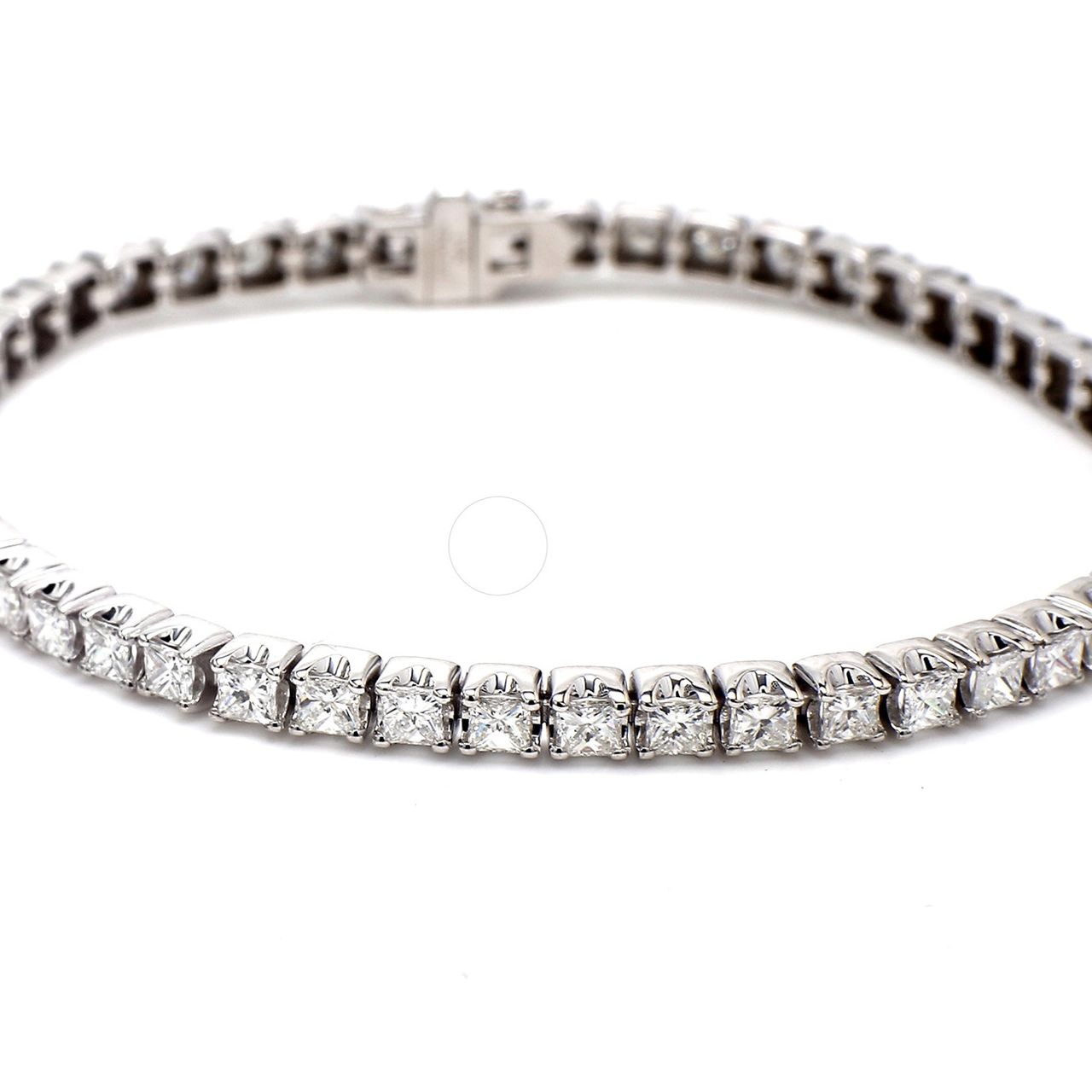 7' Tennis bracelet with 4-prong set (51) princess cut diamonds.  D5.06ct.t.w.