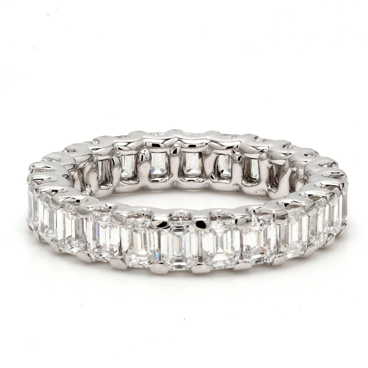 Eternity band with U-prong set (24) emerald cut diamonds.  D3.91ct.t.w.  Size 6.5