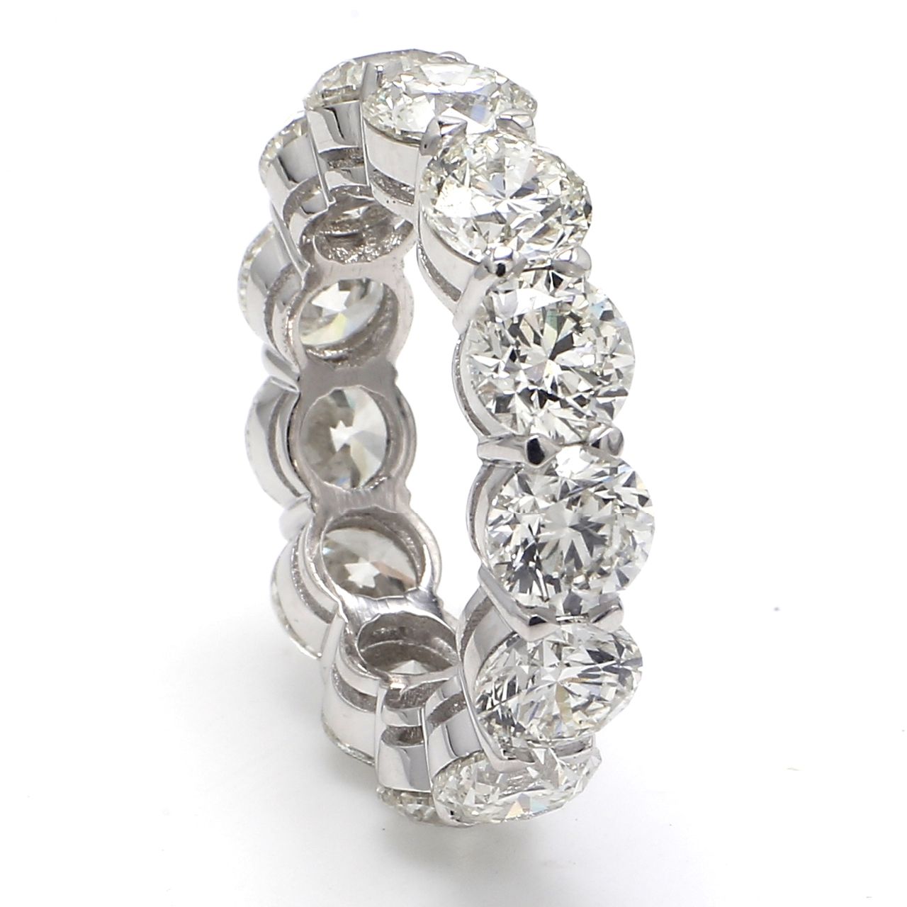 Eternity band in platinum with basket claw prong set G-I/VS2-SI1 (13) round diamonds.  D10.42ct.t.w.  Size 7