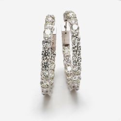 1.25' Inside out hoop earrings with prong set (34) round diamonds.  D8.77ct.t.w