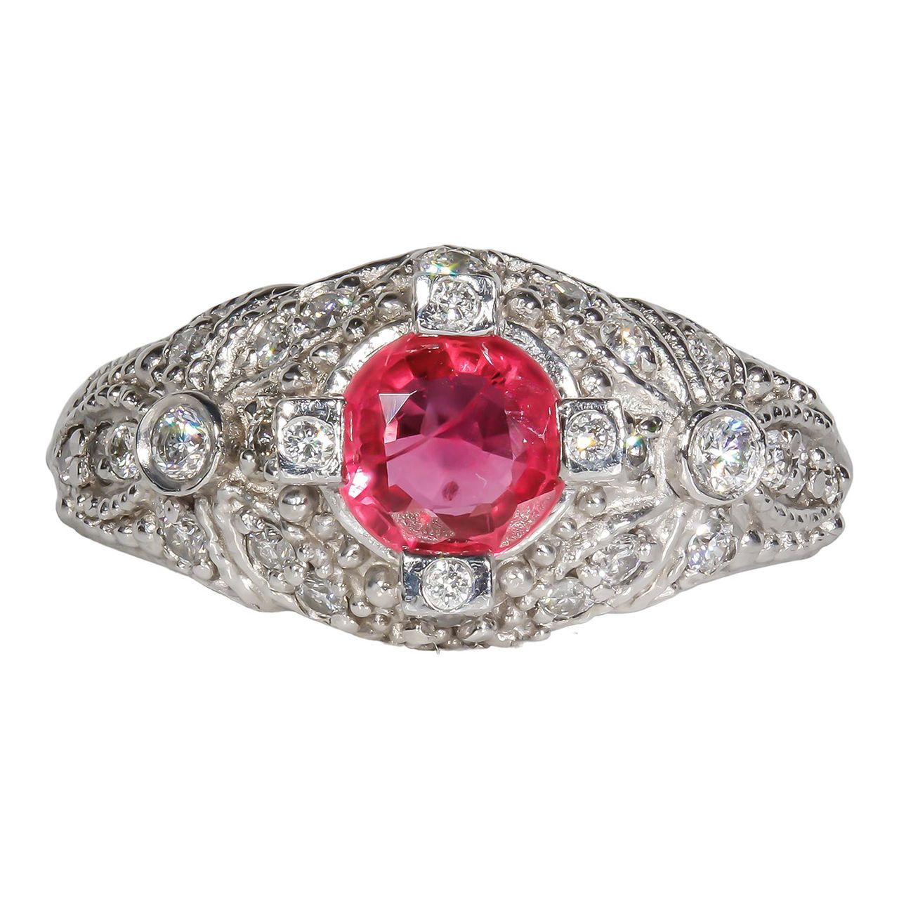 Antique style ring in platinum with round diamonds & round shaped Ruby center.  D0.37ct.t.w.  Ruby 1.06ct