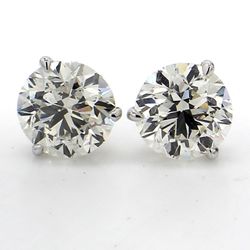 Stud earrings martini style with 3-prong GIA certified M/VS1-SI2 and USA certified K-L/VS2-SI1 round diamonds.  D5.01ct.t.w.