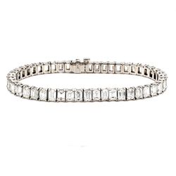 7' Tennis bracelet in platinum with 4-prong set (49) emerald cut diamonds.  D15.30ct.t.w.
