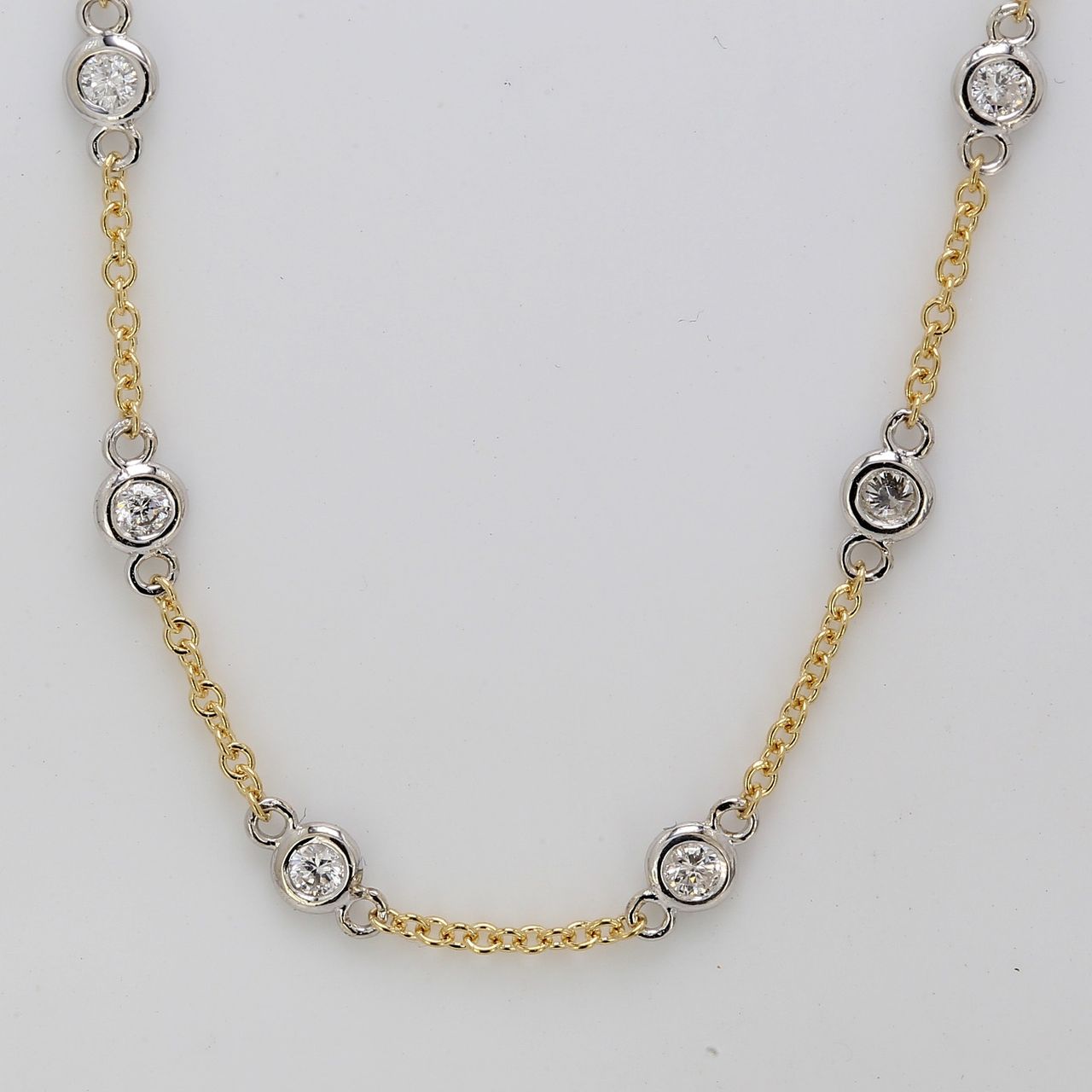 24' Diamonds by the yard necklace in 18K two-tone with bezel set (40) round diamonds.  D1.22ct.t.w.