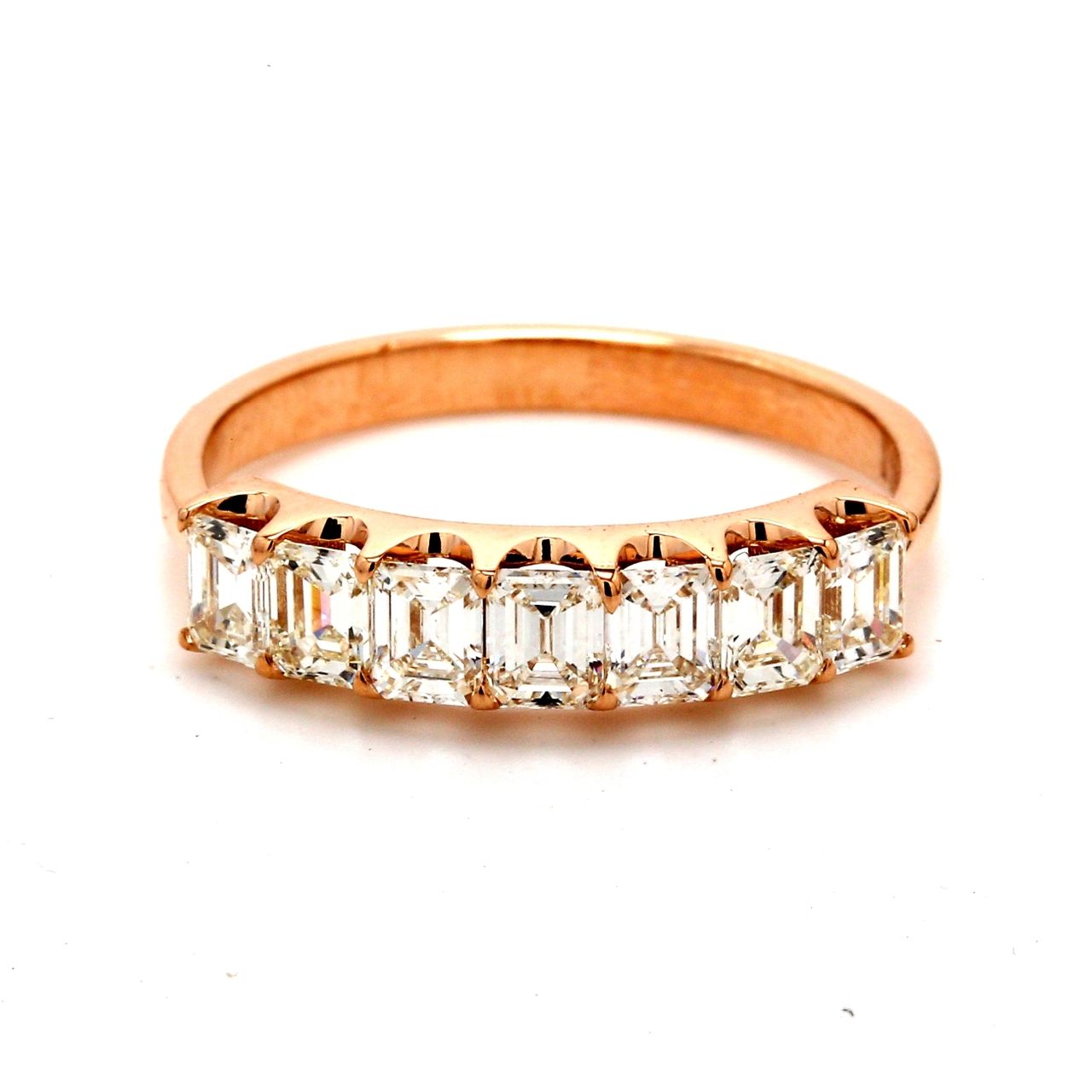 7-stone band in 1K RG with U-prong set emerald cut diamonds.  D1.05ct.t.w.  Size 6.5