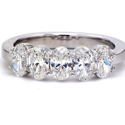 5-stone band in platinum with basket prong set oval cut diamonds.  D1.40ct.t.w.  Size 6