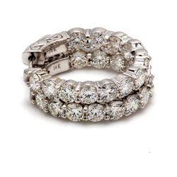 1' Inside out hoop earrings with shared prong set (24) round diamonds.  D4.20ct.t.w.