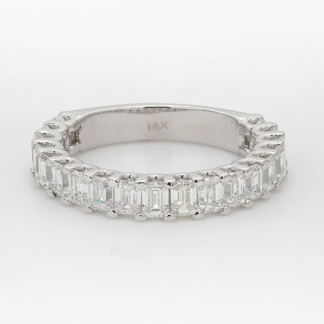 19-stone band with shared prong set emerald cut diamonds.  D2.25ct.t.w.