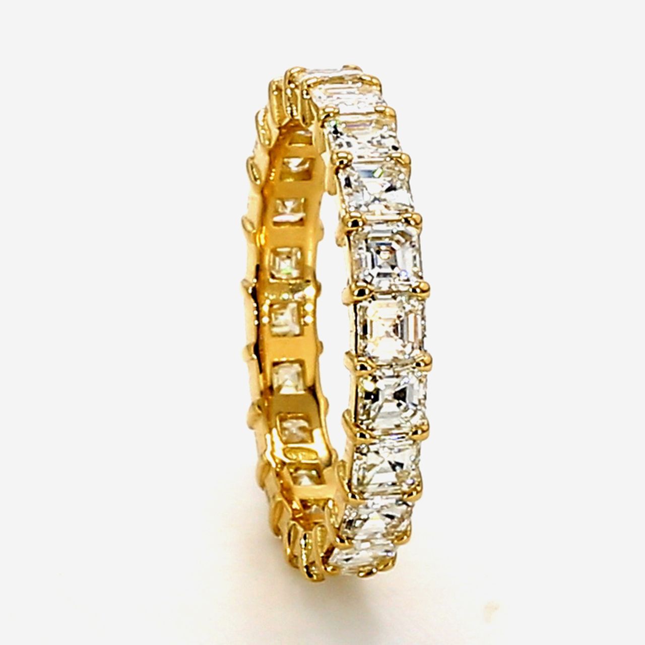 Eternity band in 18K YG with U-prong set (22) asscher cut diamonds.  D2.47ct.t.w.  Size 6