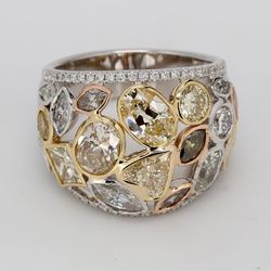 Cocktail band in 18K WG with french pave set round sides & bezel set white and fancy colored assorted shaped diamonds.  D4.98ct.t.w.  Size 6.75