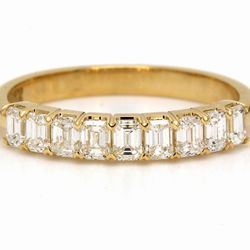 9-stone band in 18K YG with prong set emerald cut diamonds.  D0.80ct.t.w.  Size 6