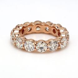 Eternity band in 18K RG with shared prong set round diamonds.  D4.63ct.t.w.