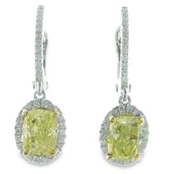 Halo dangling earrings in 18K WG with French pave set rounds around prong set fancy yellow oval diamonds.  D1.99ct.t.w.