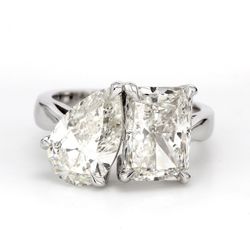 2-stone ring with claw prong set pear shape and radiant cut diamonds.  D5.08ct.t.w.