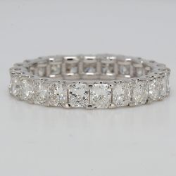 Eternity band with shared U-prong set radiant diamonds.  D3.49ct.t.w.  Size 7.25