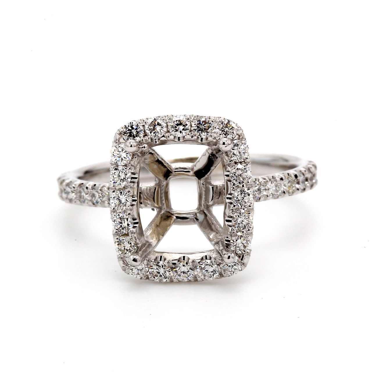 Halo semi-mount with shared prong set round diamonds.  D0.55ct.t.w.  Size 5.75