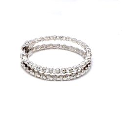 1' Inside out hoop earrings with channel set (54) round diamonds & with special spring lock.  D2.68ct.t.w.