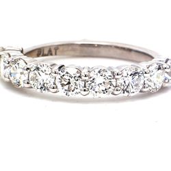 9-stone band in platinum with prong set round diamonds.  D1.35ct.t.w.  Size 5