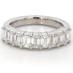 9-stone band in platinum with prong set emerald cut diamonds.  D1.29ct.t.w.  Size 4.5